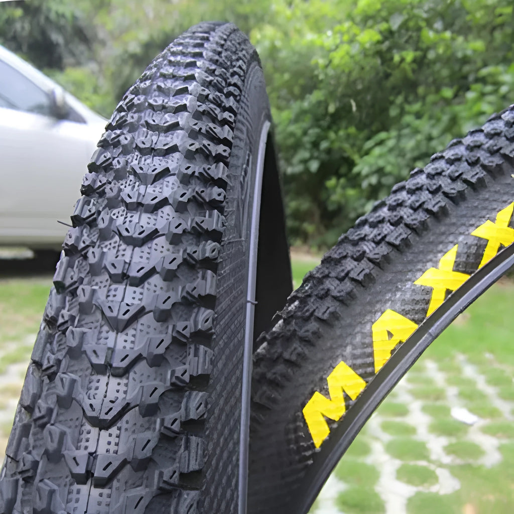 Mountain bike ultralight puncture proof tyre showing tread and sidewall, available in 26, 27.5, and 29-inch sizes.