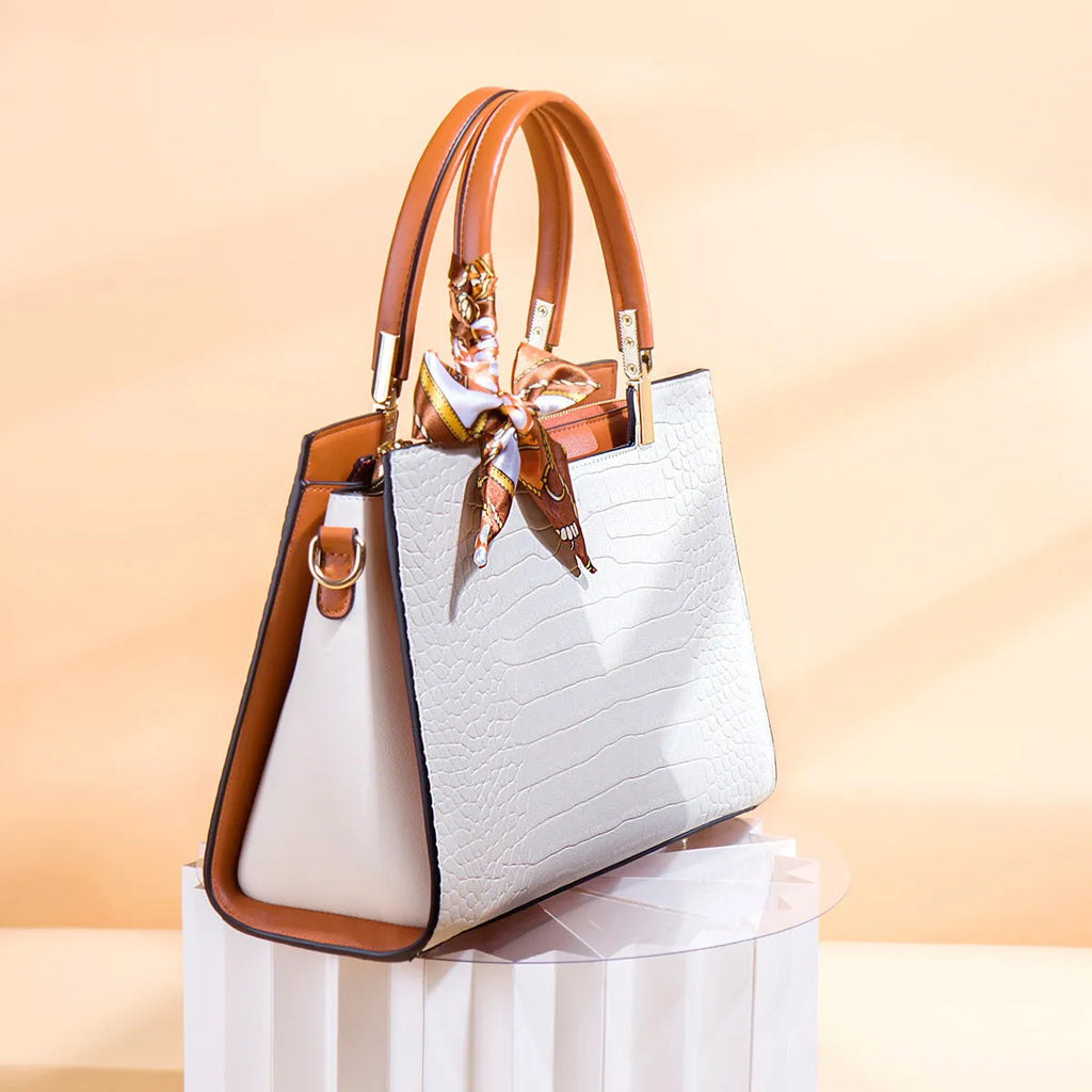 Milky white women's large-capacity PU shoulder handbag with sewing lines and multiple compartments.