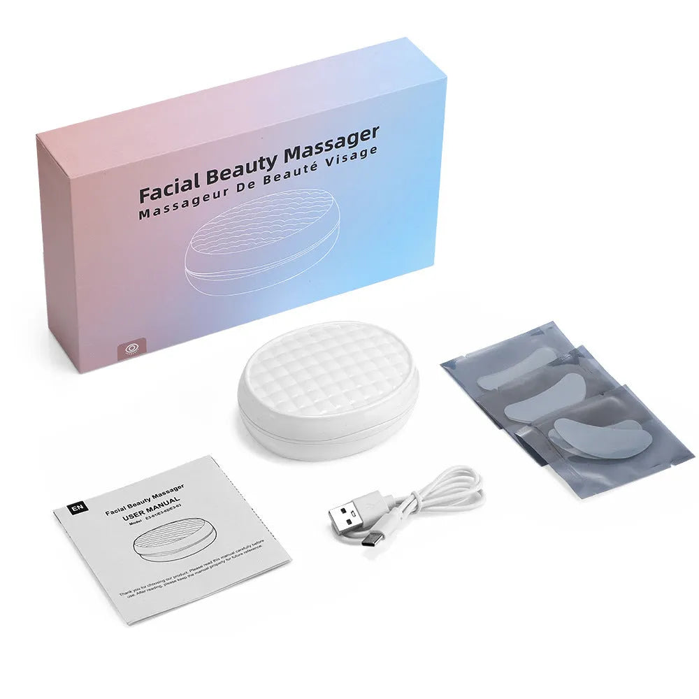 White wireless red light EMS facial and eye massager for home dark circle treatment