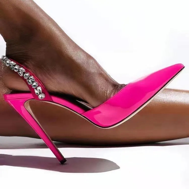 Women's black patent leather pointed-toe high heel sandals with side rhinestone decoration.