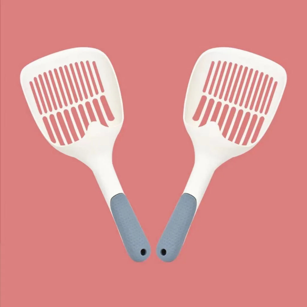 Large white plastic cat litter shovel with slotted drainage holes on a 22cm wide scoop