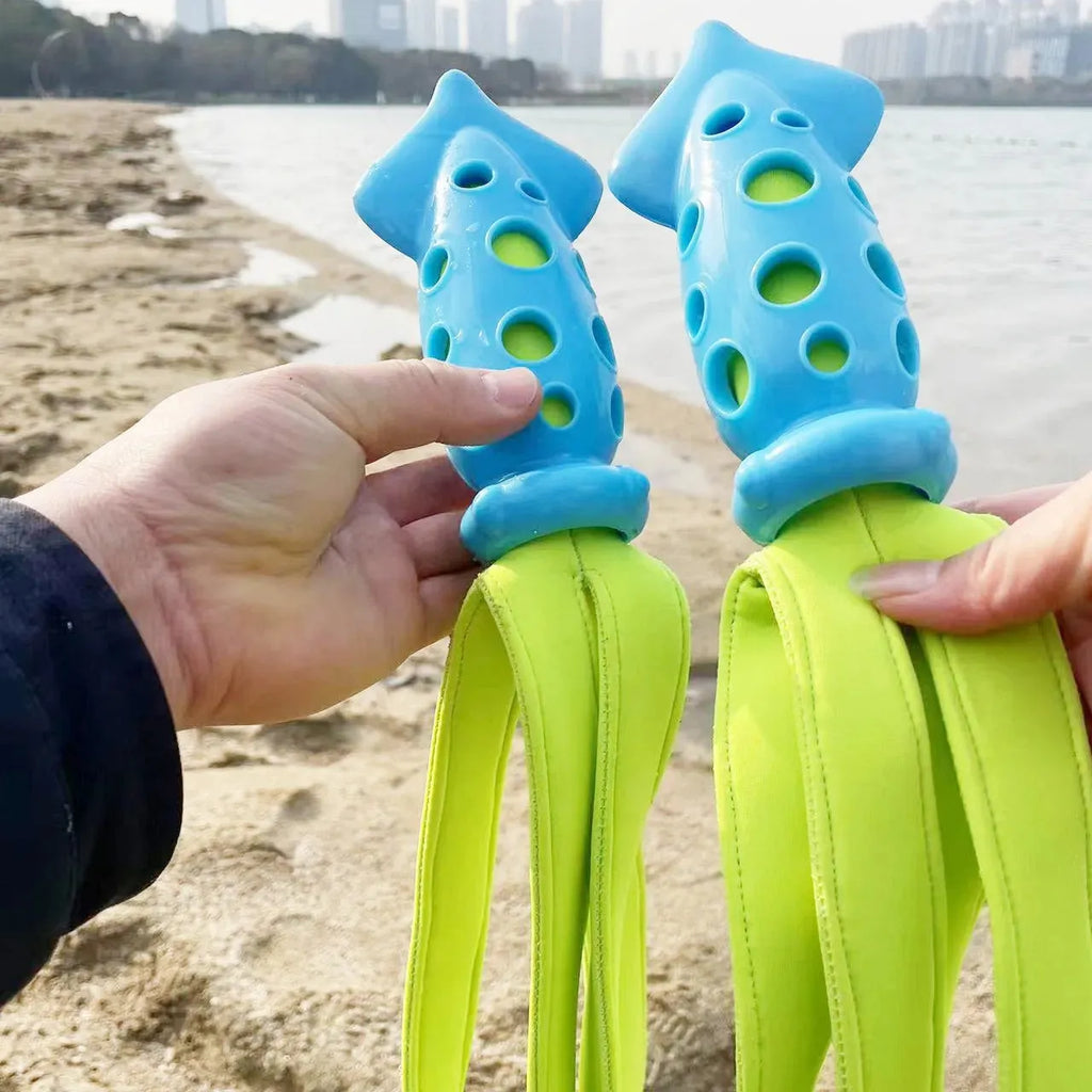 Blue cuttlefish-shaped dog chew toy with squeaky sound device for interactive play