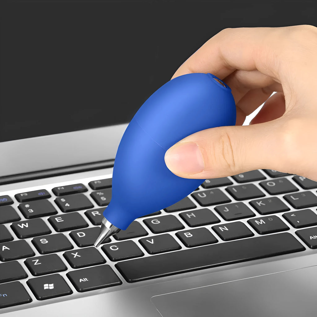 Blue and black handheld rubber dust blower for cleaning cameras and phones.