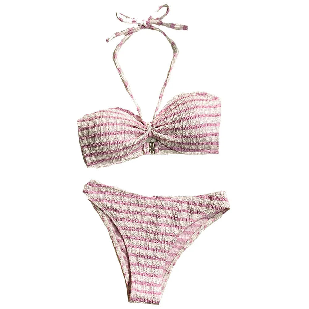 Women's pink and black striped printed bikini swimsuit on a hanger.