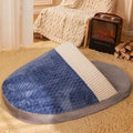 Blue dog nest sleeping bag with removable cover, shown in a medium size.