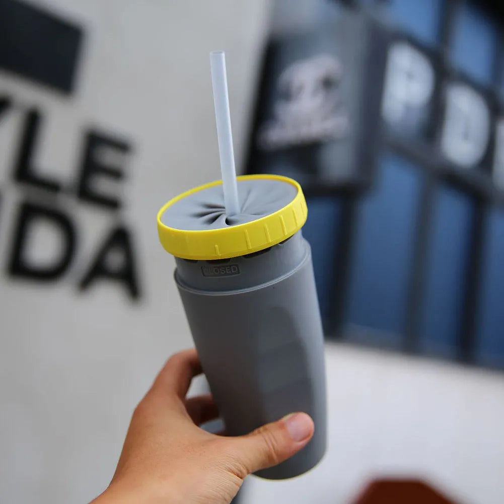 Double wall insulated travel mug with twist top silicone seal showing straw accommodation