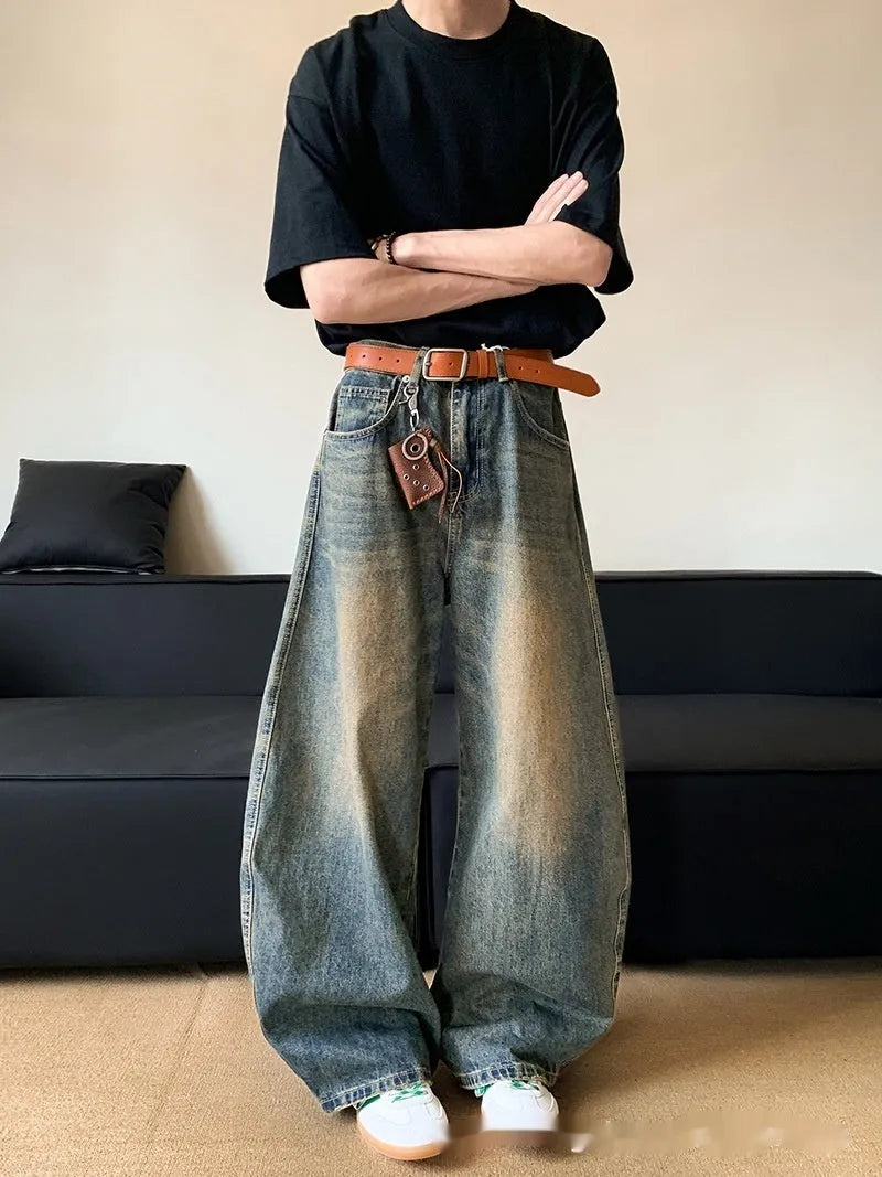 Men's retro blue distressed wide-leg denim jeans with micro-elastic fabric and zipper fly