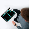 Black football training mat with non-slip rubber base measuring 60cm by 90cm