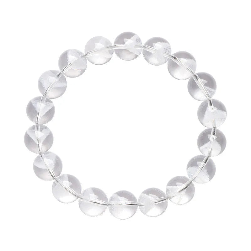 Women's white crystal pyramid bracelet with Ruyi symbol, showing polished beads.