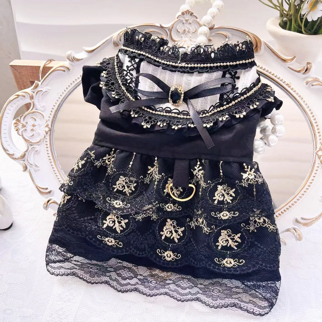 Golden gothic princess style skirt dress for a small dog on a mannequin, showing the skirted design.