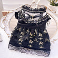 Golden gothic princess style skirt dress for a small dog on a mannequin, showing the skirted design.