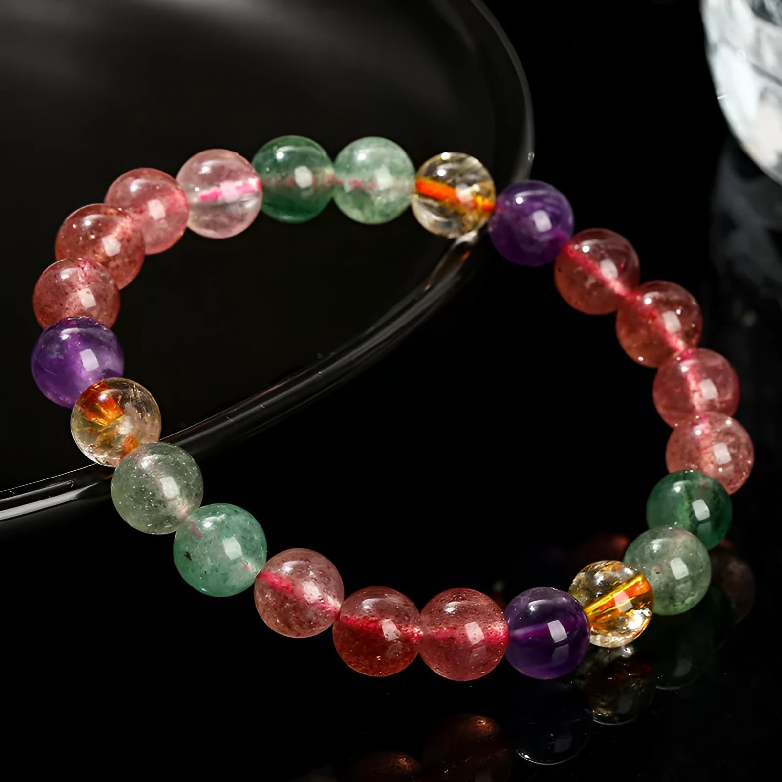 Natural strawberry quartz and tourmaline geometric bead bracelet for women in 7mm, 8mm, and 9mm sizes.