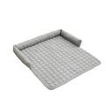 Thick corduroy pet bed mat with neck pillow in beige, 75x75cm, on a floor