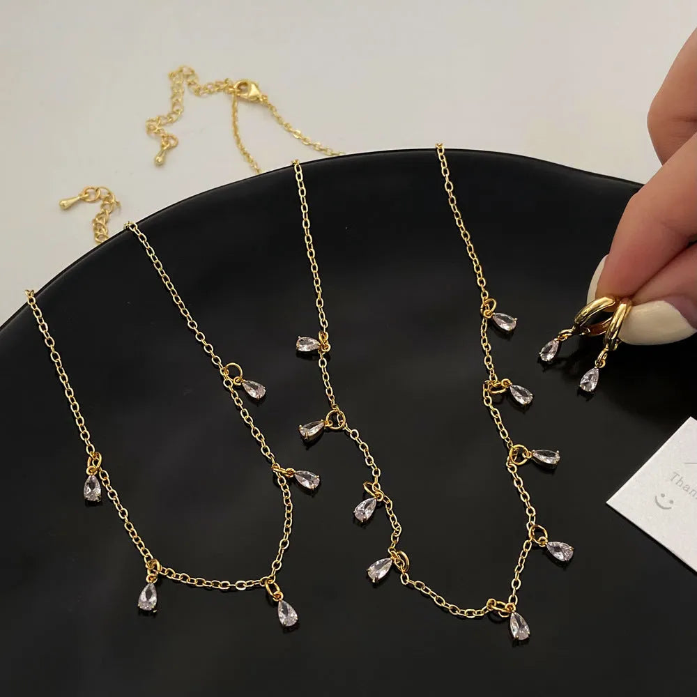 Geometric zircon jewellery set with necklace, earrings and anklet in Korean-style meteor shower design