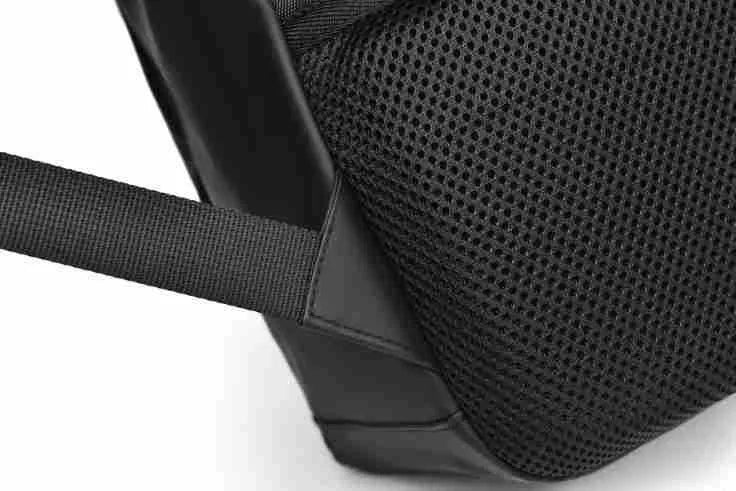 Large waterproof backpack in black, blue, or grey with PU leather construction and computer compartment