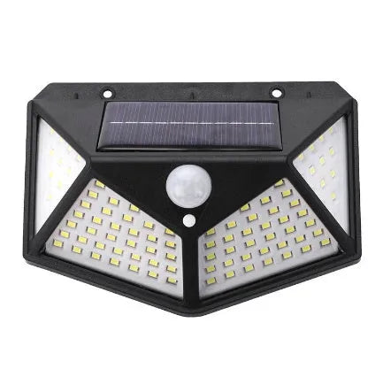 White outdoor solar garden lamp with integrated solar panel on top and LED light array.