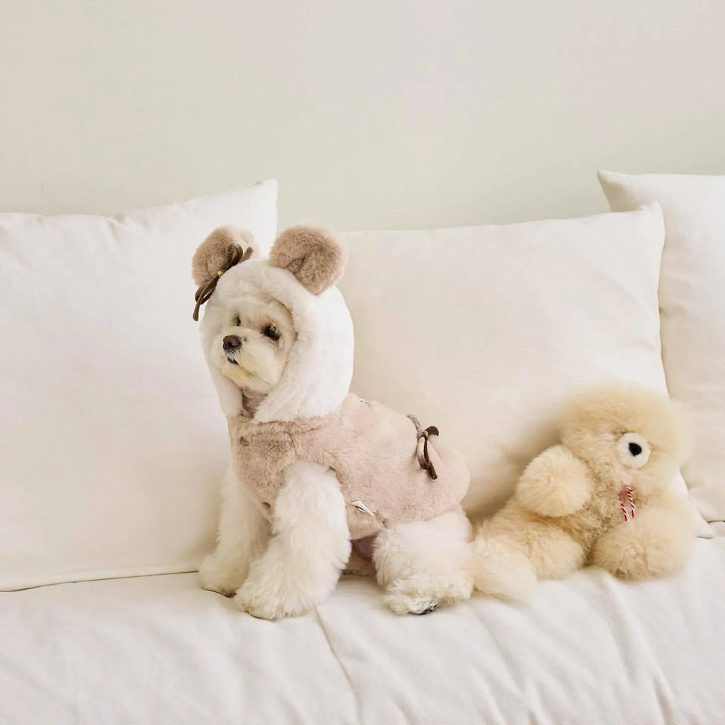Light pink polyester warm coat for a dog or cat, showing casual costume style.
