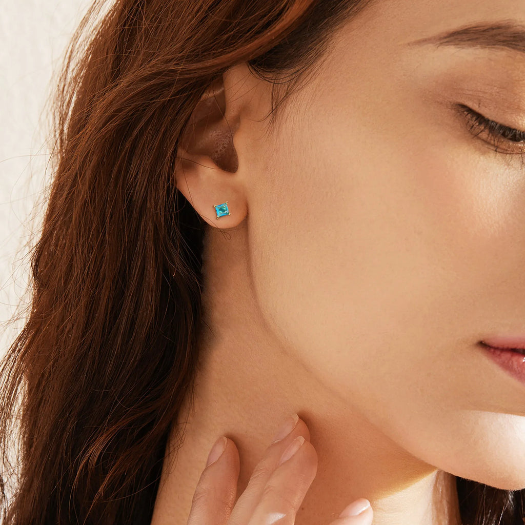 Gold-plated drop-shaped earrings with pear zircon stone in candy colours on copper base.
