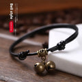 Nylon rope dog collar with brass bell shown in black, red, and coffee colours