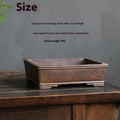 Rectangular purple sand bonsai pot with rustic firewood texture, shown empty for scale.