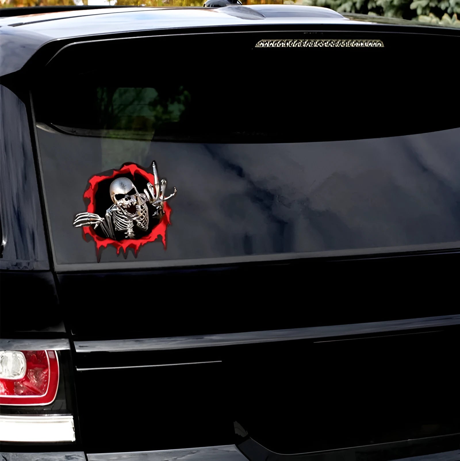 Reflective metal skull car sticker with colourful broken shell pattern measuring 15 by 14 centimetres