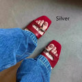 Square toe leather and rubber plus size outdoor slippers in red, shown from the side.