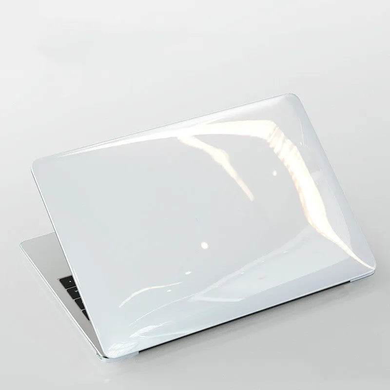 Transparent and black PC hard shell protective case for Apple MacBook Pro 14-inch and 16-inch laptops.