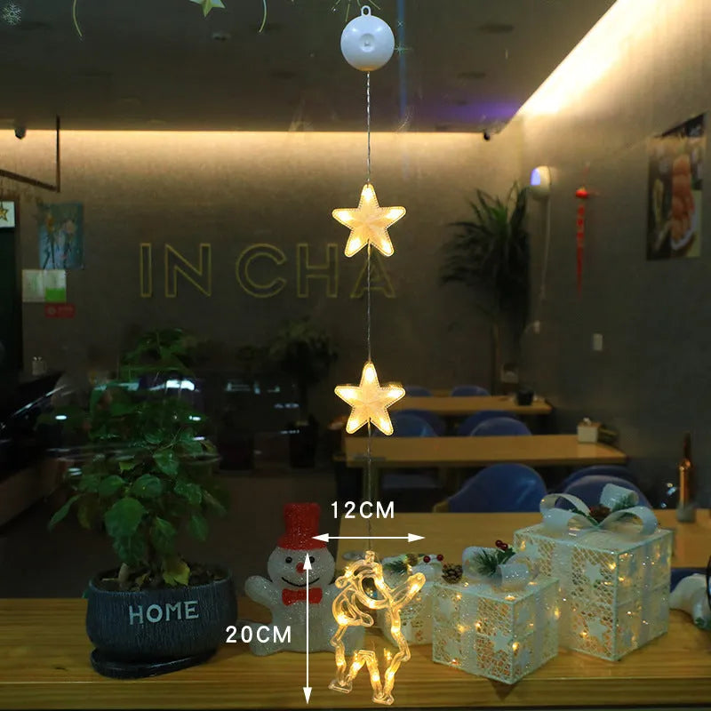 Christmas window lights with star-shaped LED pendants and suction cups for battery-operated festive decoration