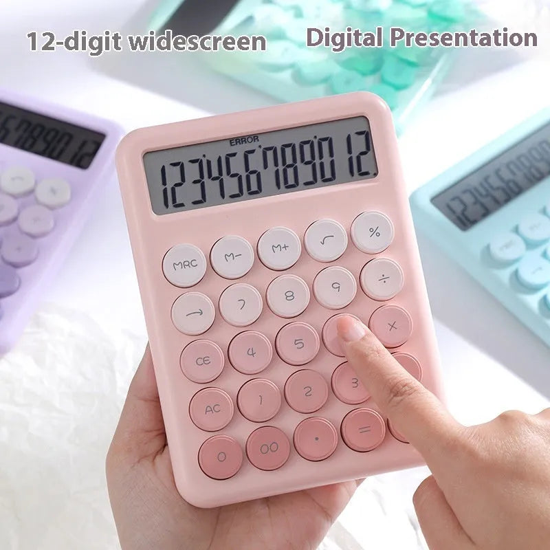 Gradient colour desk calculator in violet, pink, blue, or mint green on a desk.