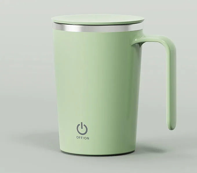 White automatic electric stirring cup with stainless steel finish and minimalist design on a table.
