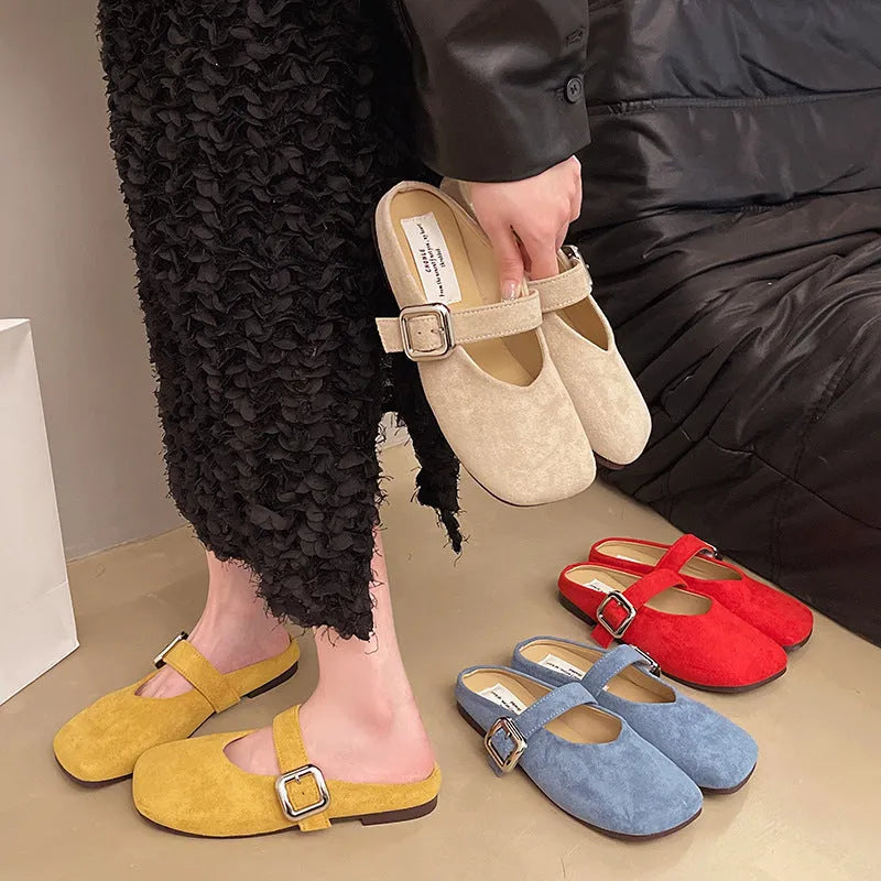 Women's flat closed-toe half slipper in a choice of colours, showing square toe and rubber sole.