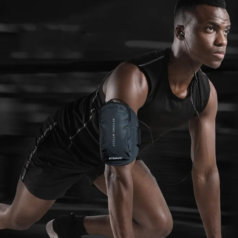 Lightweight reflective running arm bag in fluorescent yellow, shown on an arm.
