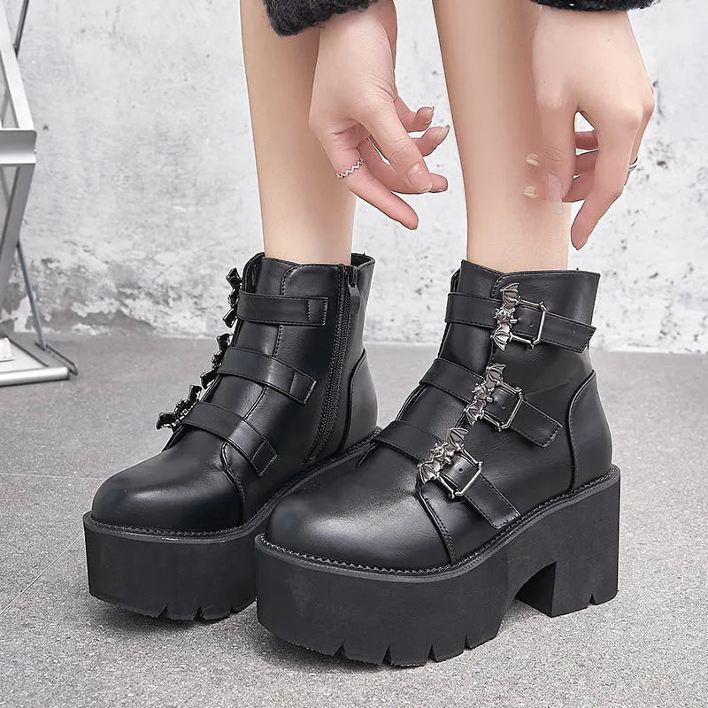 Black women's punk gothic short boots with bat buckle and side zipper on thick heel.