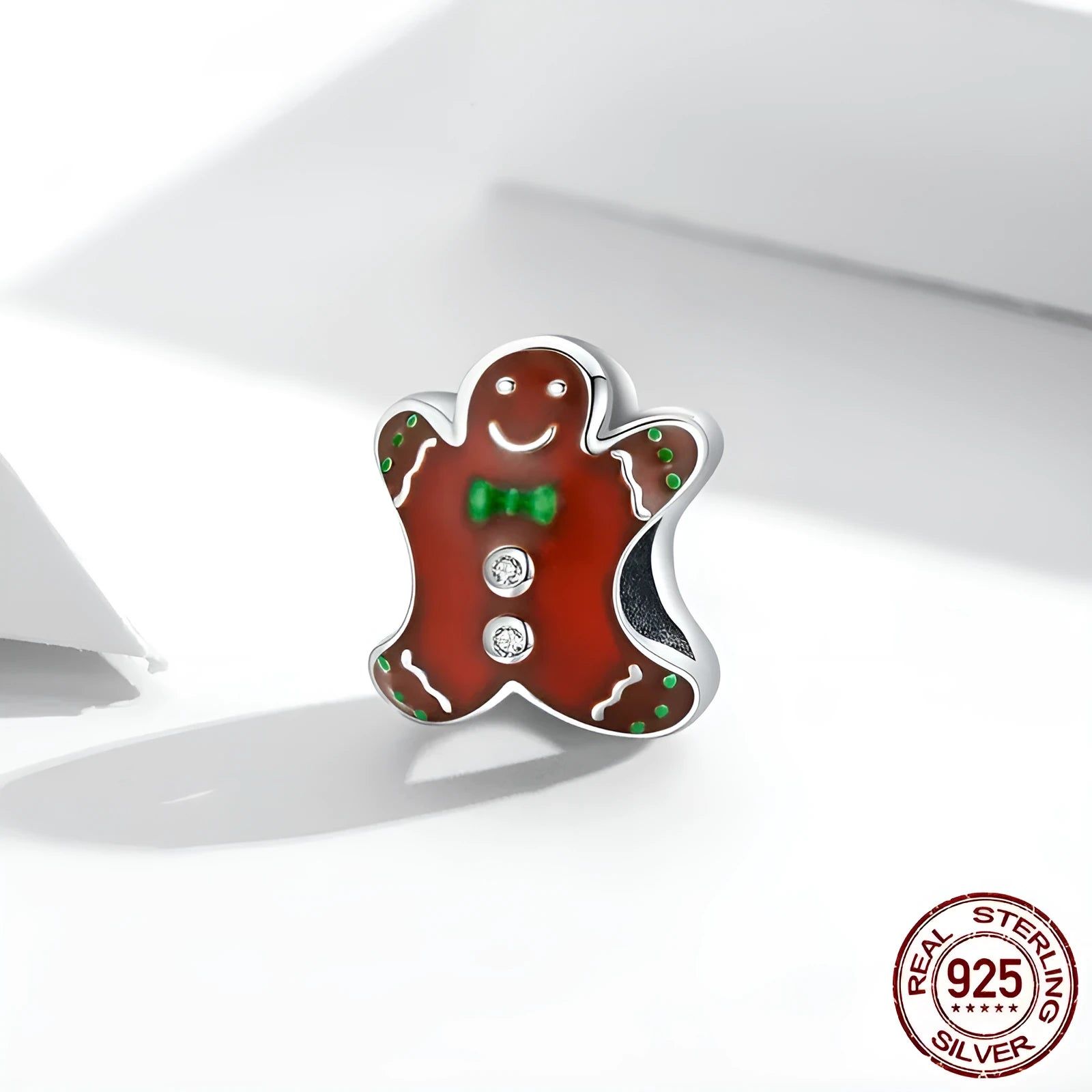 Christmas gingerbread man 925 sterling silver bead with dripping oil finish, 1.2cm height, 0.5cm aperture, on white background