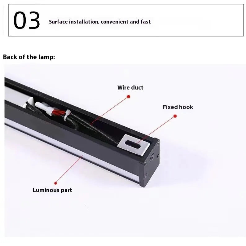 Black 80cm long aluminium LED strip wall lamp mounted on a white wall.
