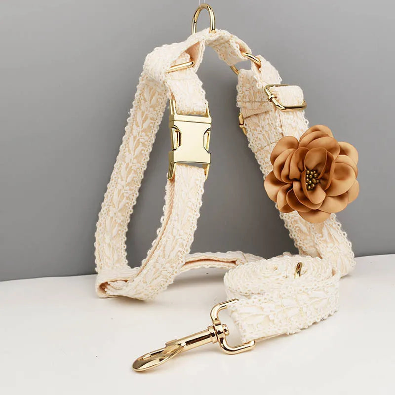 Leaves and lace pattern dog wedding collar and leash set with vest and floral accessories on a white background.