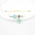 Glass dried flower bracelet with real preserved flowers and lace trim on large 1.4cm beads