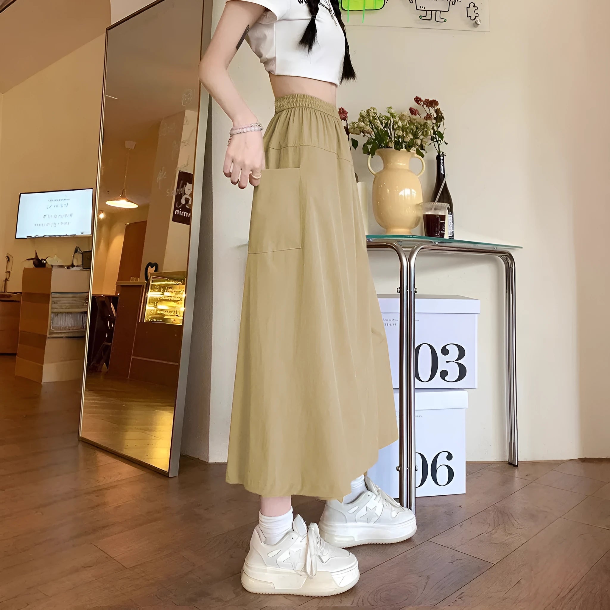 Camel coloured women's wide leg skirt with elastic waist and cropped length