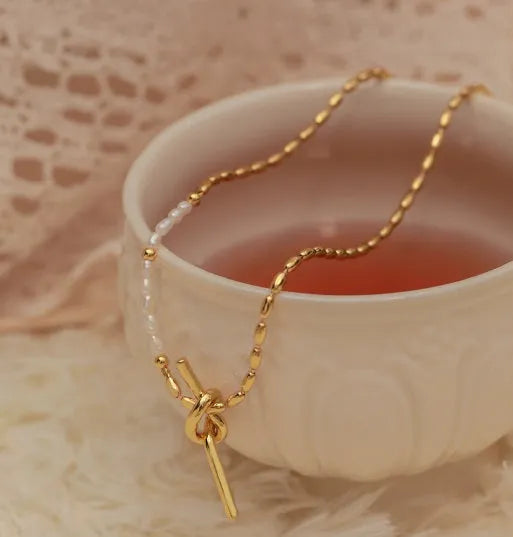 Gold copper natural real pearl necklace with geometric ring and line cold style pendant on woman