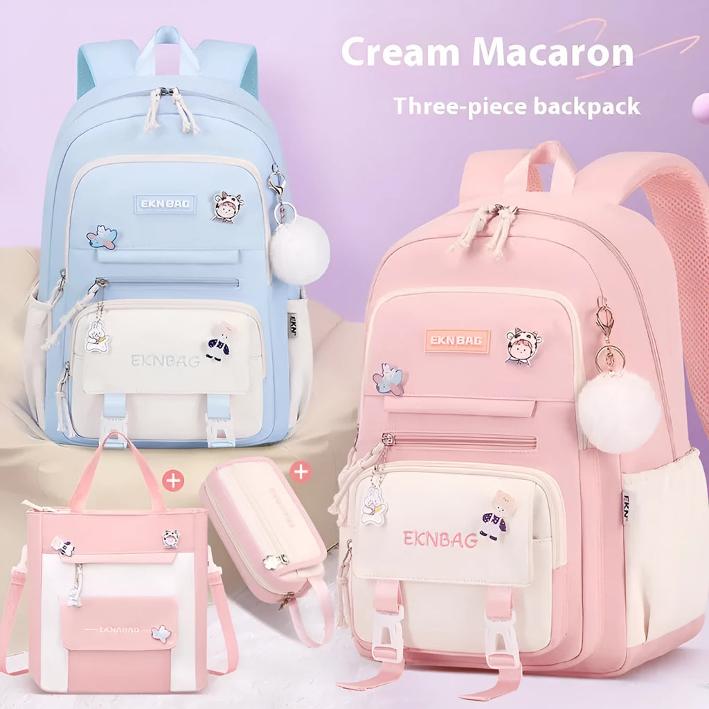 Pink waterproof Oxford cloth school backpack for girls with curved shoulder straps, shown with a matching pencil case.