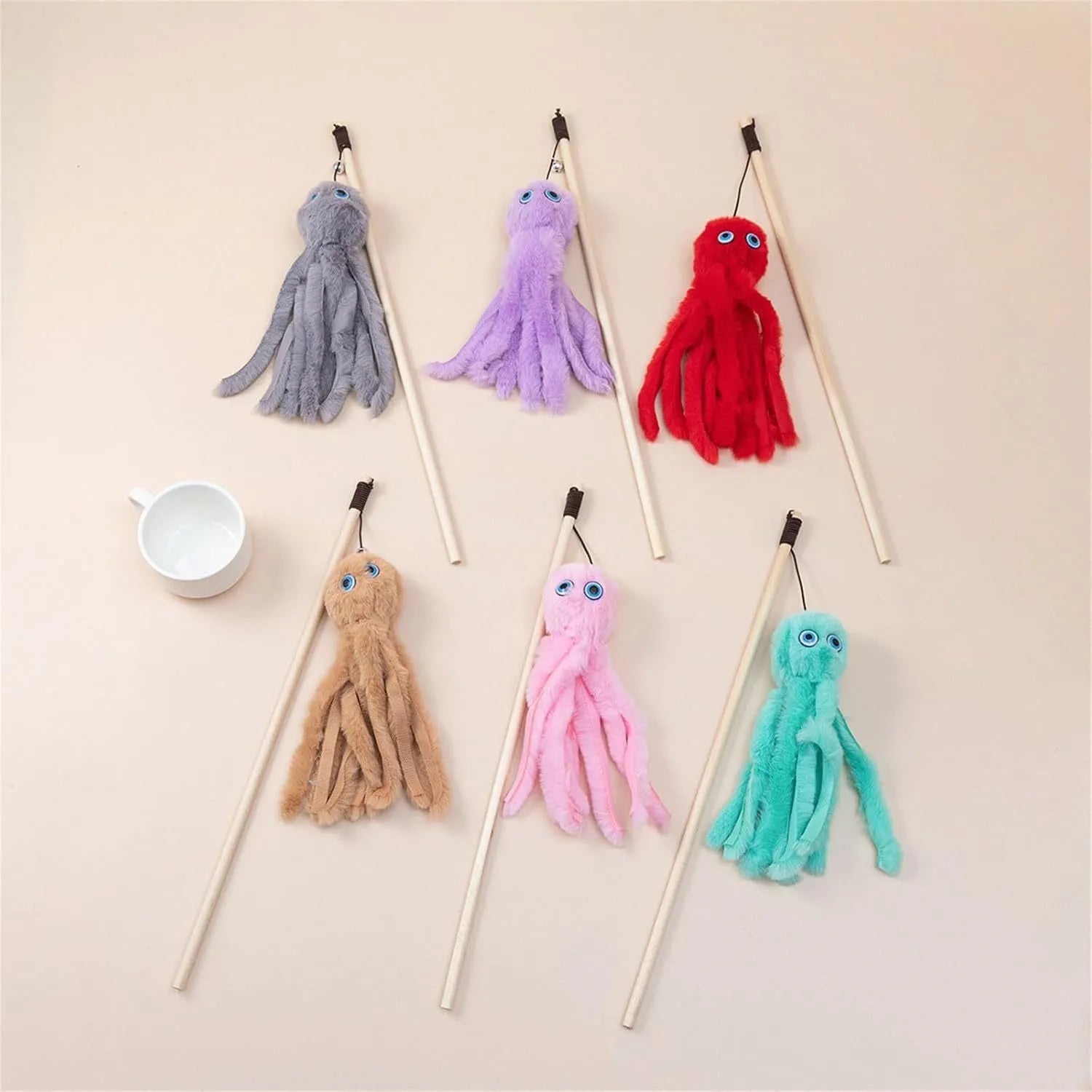 Colourful plush octopus cat toy attached to a long stick for interactive play.