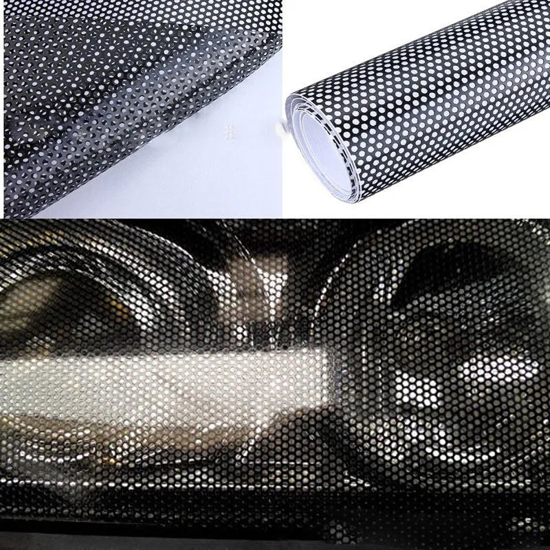 Roll of black perforated mesh automotive colour change vinyl film showing texture