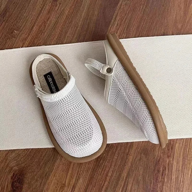 Beige linen slip-on shoes with a round toe and breathable mesh lining on a soft rubber sole.