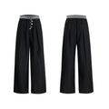 Straight-leg high-waist trousers with button front closure in black colour