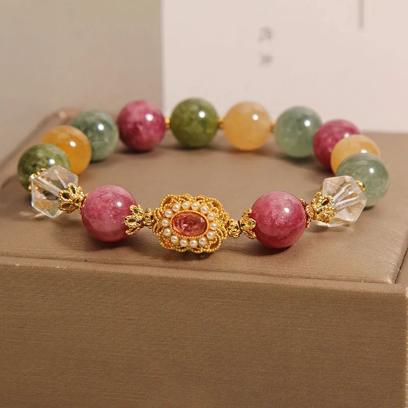 Women's alloy bracelet with colour tourmaline round beads on a pearl crystal base and rhinestone details.