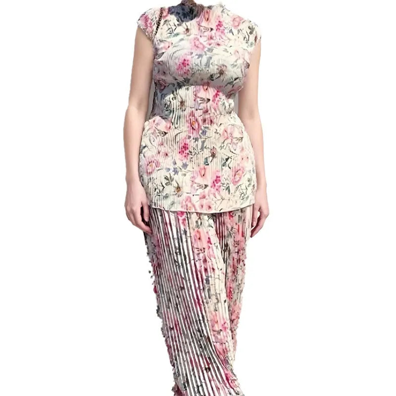 Women's printed chiffon dress set with high waist skirt and long sleeve top.