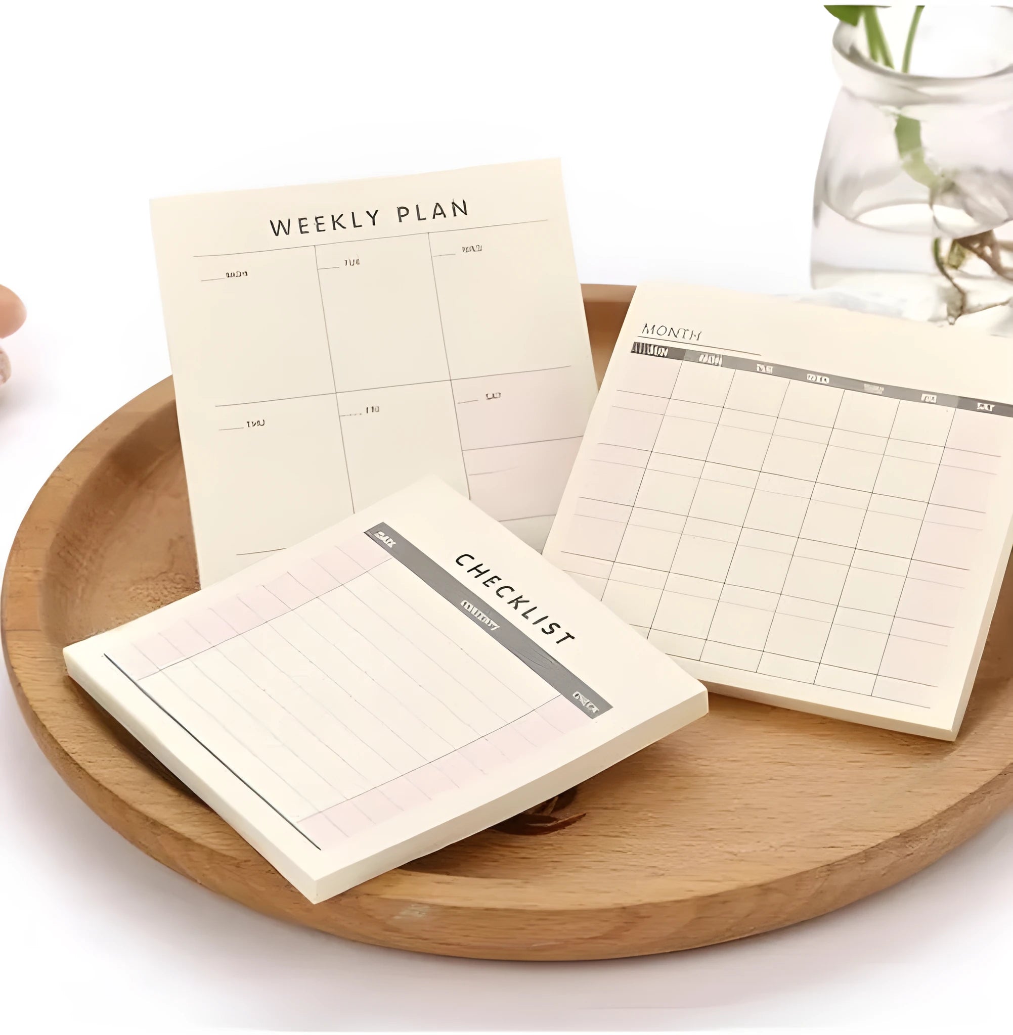 Small 9.5cm square paper planner with 60 sheets, available in monthly, weekly, or work planner style