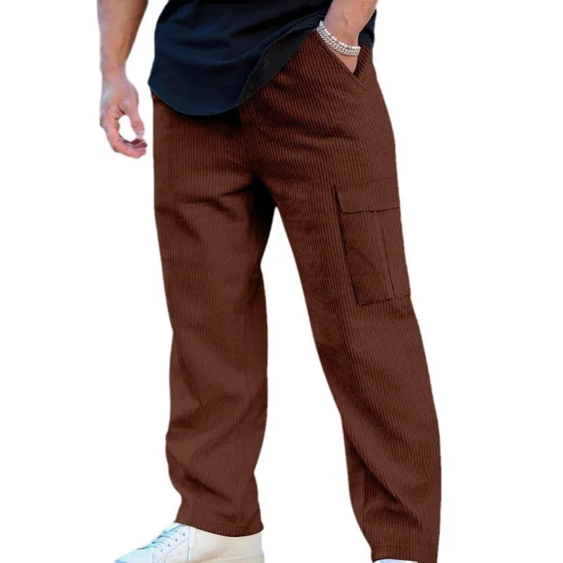 Men's loose-fitting corduroy cargo trousers in army green with a straight leg and drawstring waist.