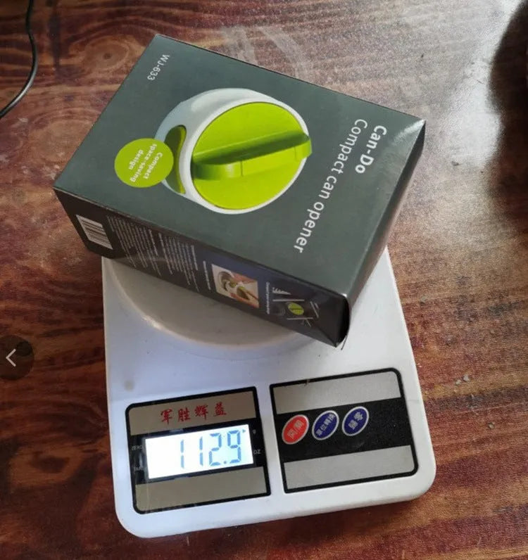 Green stainless steel lid opener kitchen gadget showing dimensions and screw mechanism