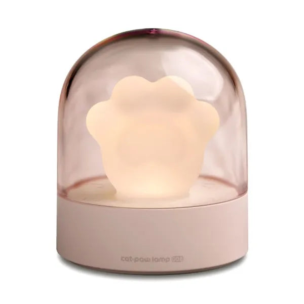 Grey cat paw shaped USB rechargeable night light with musical features on wooden desk